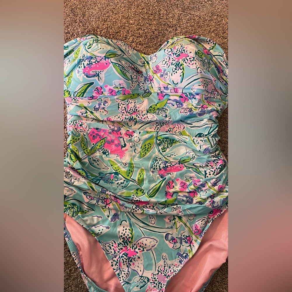 Size 10 beautiful bathing suit. As is condition. Good condition.